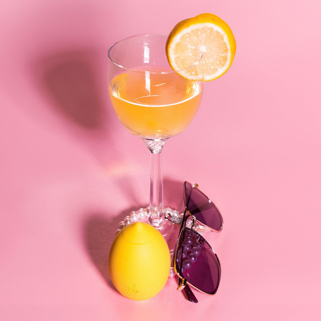 Lemon clitoral vibrator flat lay